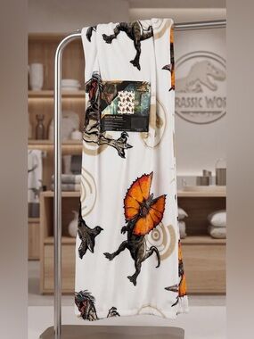 Jurassic World Dinosaur Plush Throw Blanket - White with Orange Accents 50x70in